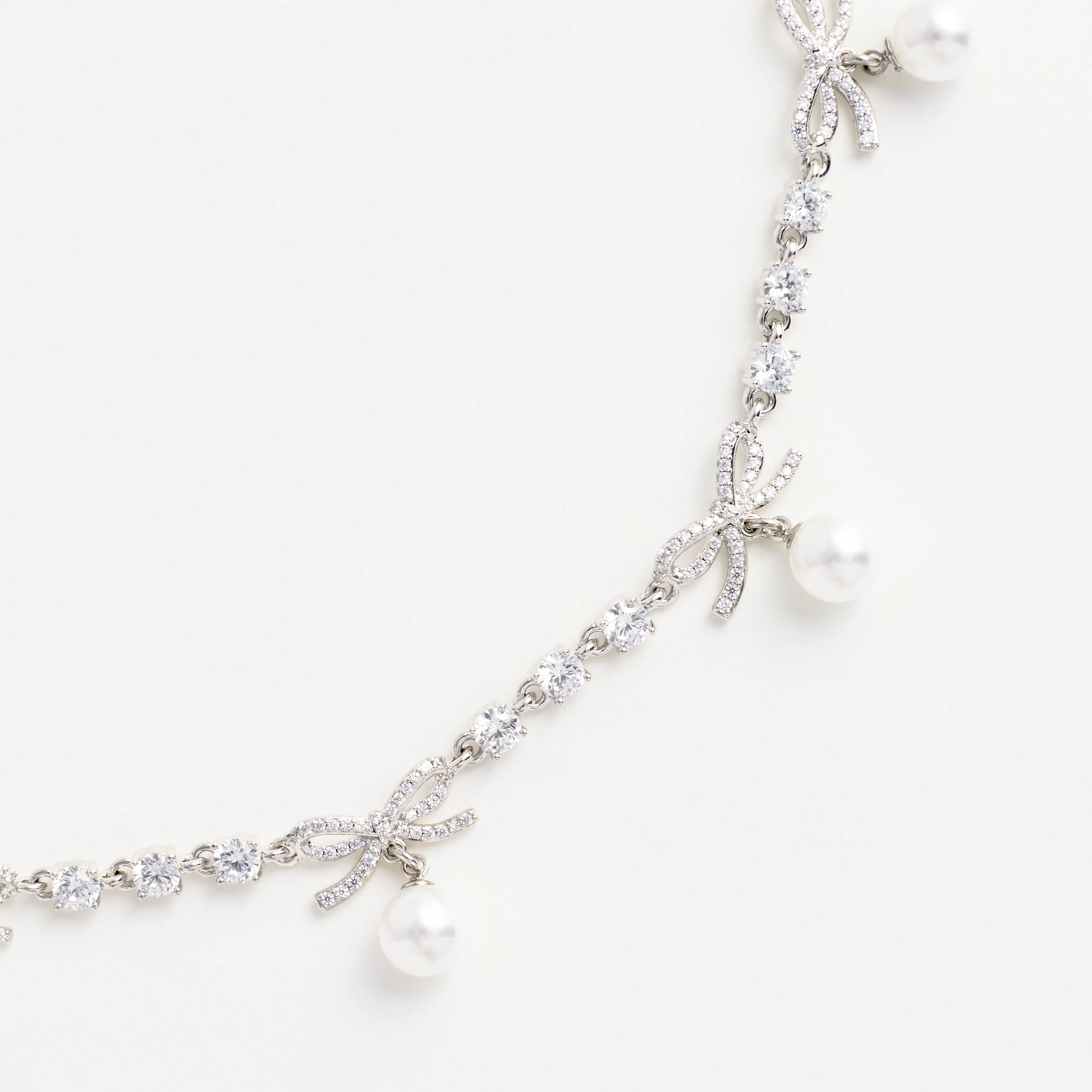 Crystal Bow Pearl Charm Necklace - Image 3